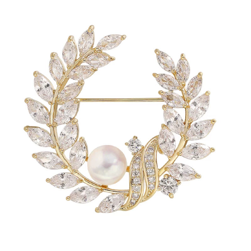 Golden pearl brooch pins
